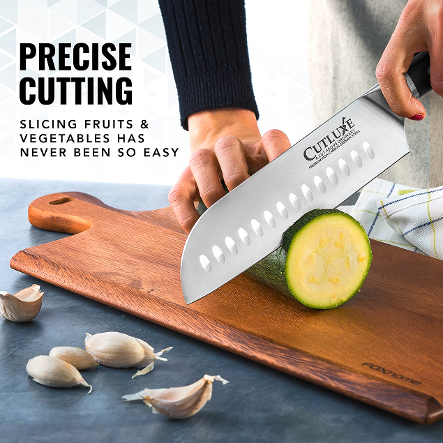 Product image 4 of 6: Precision kitchen knife slicing zucchini on wooden cutting board, ideal for home cooks and chefs