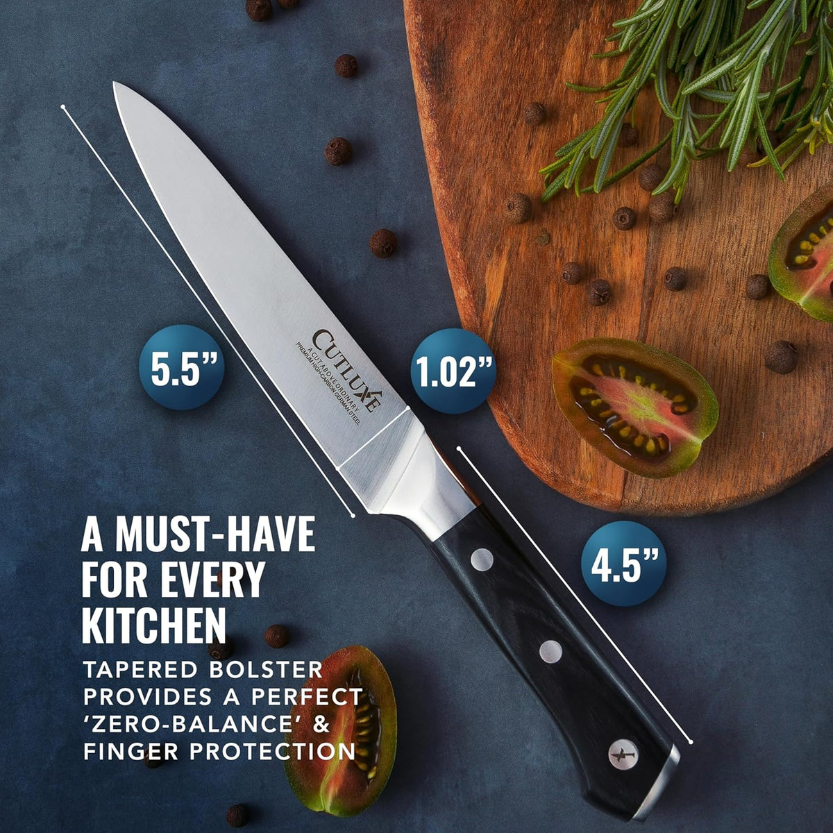 Product image 2 of 8: Premium kitchen knife with tapered bolster, ideal for home cooks and chefs, displayed with herbs and tomatoes