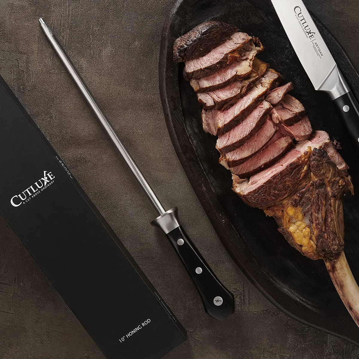 Product image 6 of 8: Sliced roast with Cutluxe knife and 10-inch honing rod on dark platter