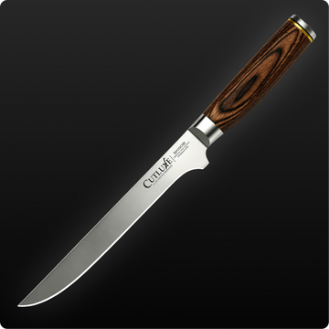 Cutluxe Shinobi kitchen knife with wooden handle and stainless steel blade on black background