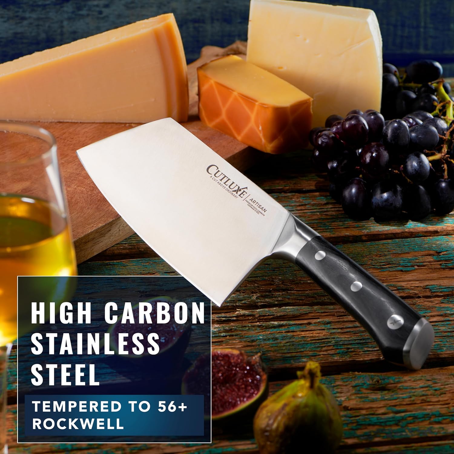 Product image 4 of 7: High carbon stainless steel cleaver knife with black handle, displayed with cheese, grapes, and figs on rustic wood.
